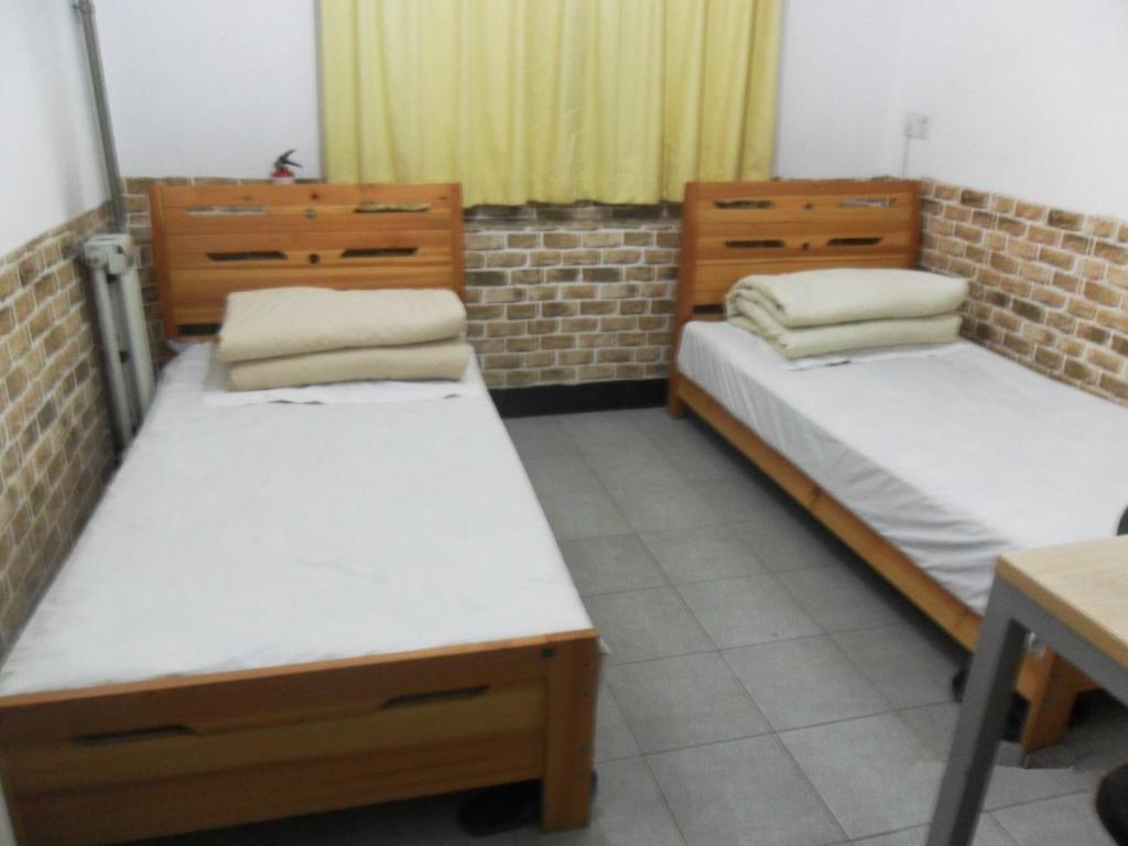 Discovery Youth Hostel Beijing Rom bilde